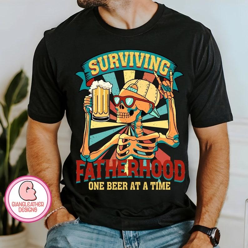 Surviving fatherhood one beer at a time shirt,dad bod shirt,fatherhood shirt,funny skeleton dad shirt,best dad ever shirt,dad shirt,funny dad quotes T-shirt, sweater and Hoodie