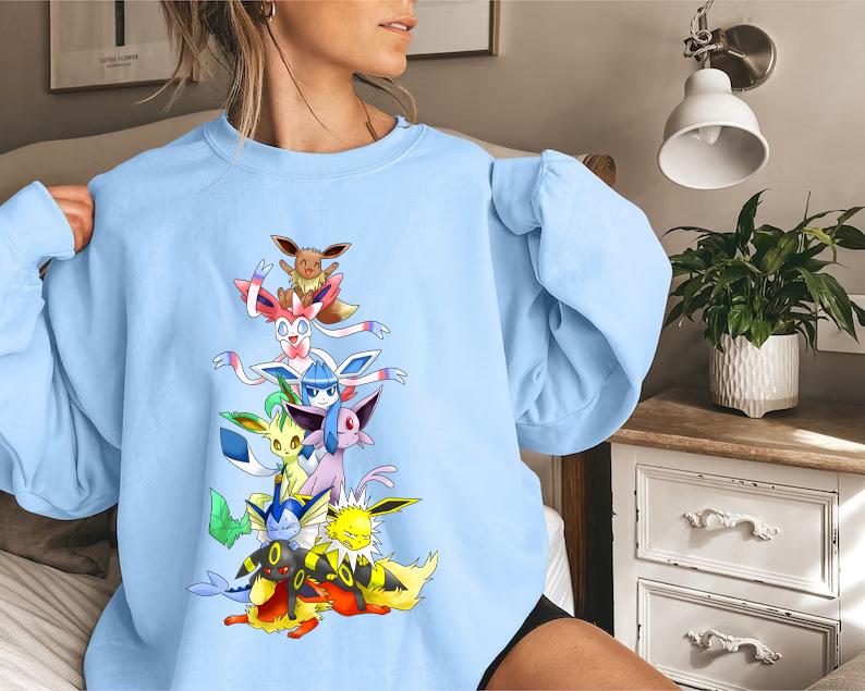 Eevee Eeveelution Sweatshirt, Eevee Evolutions Sweatshirt, Slyveon, umbreon, Espeon, Flareon Anime, Vintage Anime Sweater, Anime lover gift, Anime mer