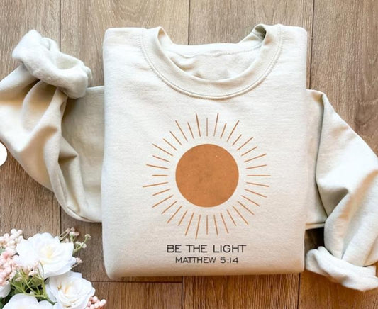 Be The Light Matthew 5:14 Sweatshirt - Unisex Religiously Inspirational Shirt with Sun Design, Made from Soft Fabric, Ideal for Giving