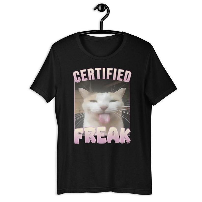 Certified Freak Funny Cat Meme T-Shirt, Ironic Unisex Graphic Apparel, Playful Clothing Gift for Meme Lovers and Quirky Trendsetters