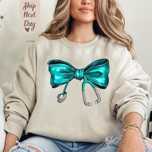 Coquette Nurse Stethoscope Bow Sweatshirt, Nurse Blue Bow Sweater, Nurse Bow Shirt, Gift For Nurse, Unisex Shirt, Full Size, Gift For Her
