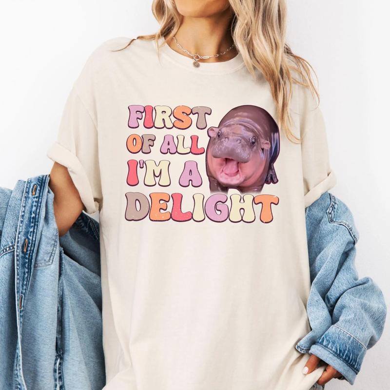Moo Deng 'First Of All I'm A Delight' T-shirt, Baby Hippo Shirt, Funny Angry Moo Deng Apparel for Hippo Lovers, Cute Shirt, Cute Sarcastic Shirts, Sar