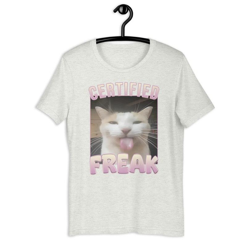 Certified Freak Funny Cat Meme T-Shirt, Ironic Unisex Graphic Apparel, Playful Clothing Gift for Meme Lovers and Quirky Trendsetters