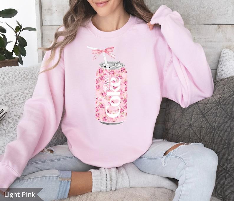Coquette Diet Coke Sweatshirt, Floral Diet Coke Shirt, Cute Baby Pink Bow Tee, Trendy Soda Can With Roses, Fun Coke Lover Gift, Coquette Pink Bow Tee