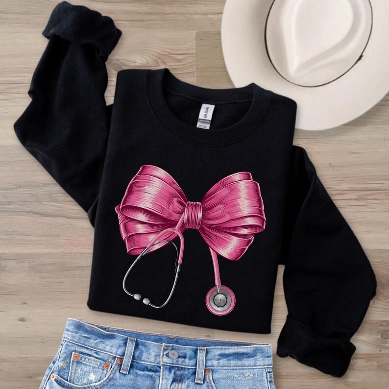 Coquette Nurse Stethoscope Bow Sweatshirt, Healthcare Worker, Nurse Appreciation, Nursing School, Future Nurse, Unisex Shirt, Gift For Her, Gift For H