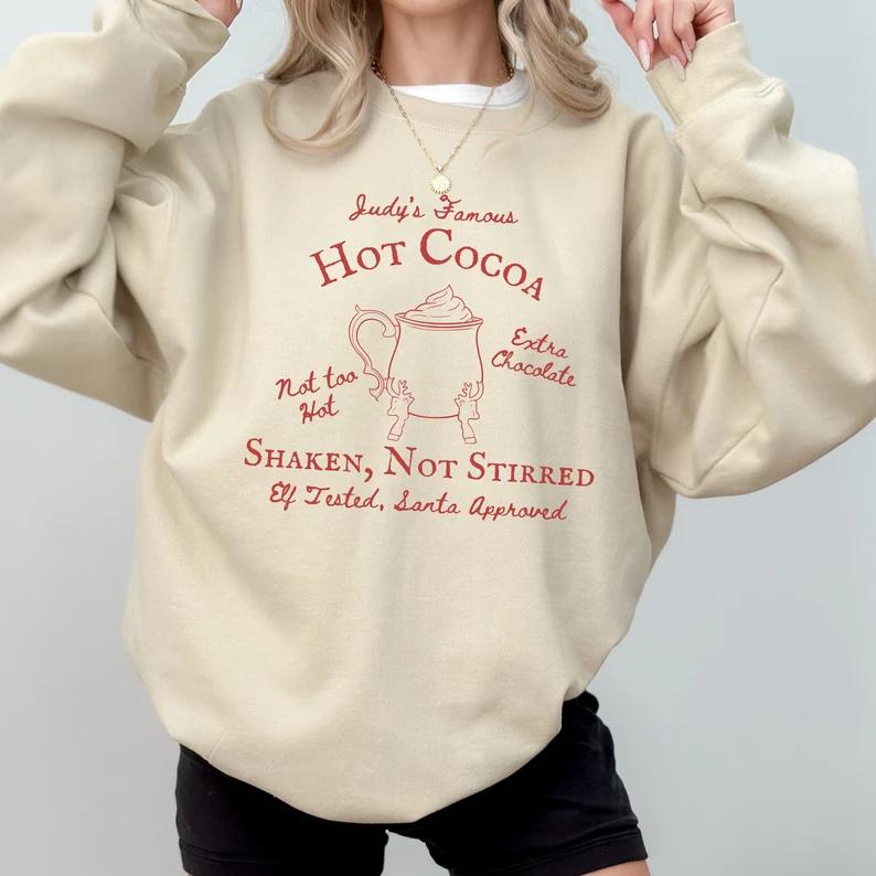 The Santa Clause Movie 90's Merch Judy's Hot Cocoa Neil Scott Calvin Charlie Christmas Gift Crewneck Sweatshirt Shirt Holiday Tim Allen