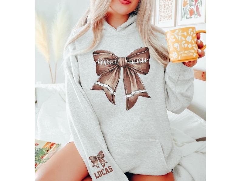 Football Bow Sweatshirt T shirt, Football Coquette Hoodie, Football Mom Shirt, Personalized Game Day Sweatshirt, Sleeve,  Football Mom  Sweatshirt, Fo