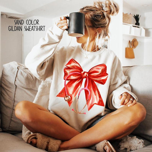 Coquette Nurse Stethoscope Bow Sweatshirt, Nurse Bow Shirt, Nurse Gift For Christmas, Coquette Nurse Shirt, Unisex Shirt, Gift For Her