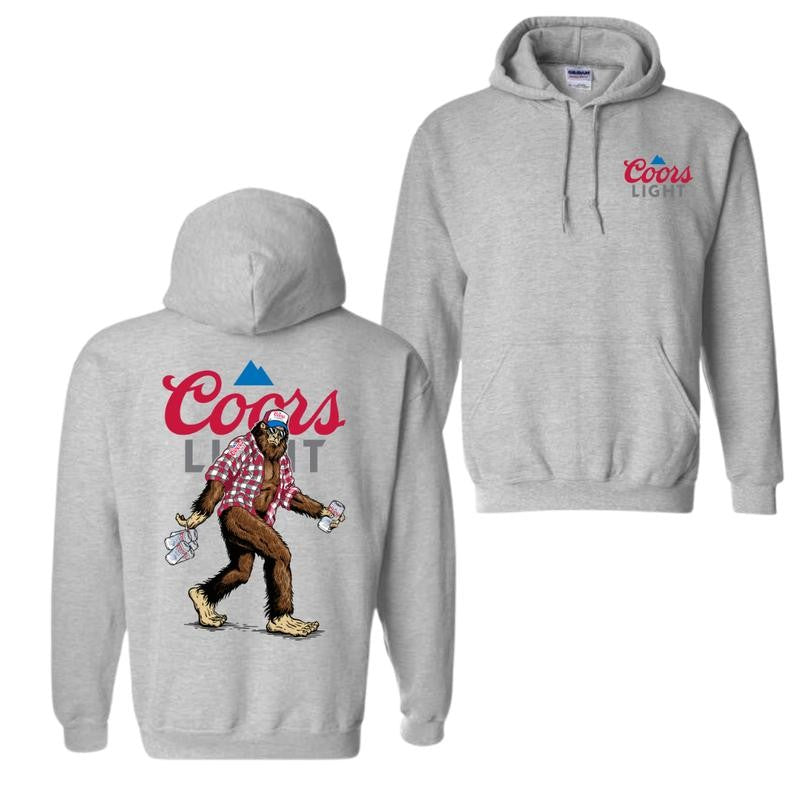 Coors Light Sasquatch Hoodie and T-shirt, Fun Bigfoot Design With Plaid Shirt And Coors Light Cans, Unisex Hoodie, Perfect For Beer Lovers And Outdoor Enthusiasts