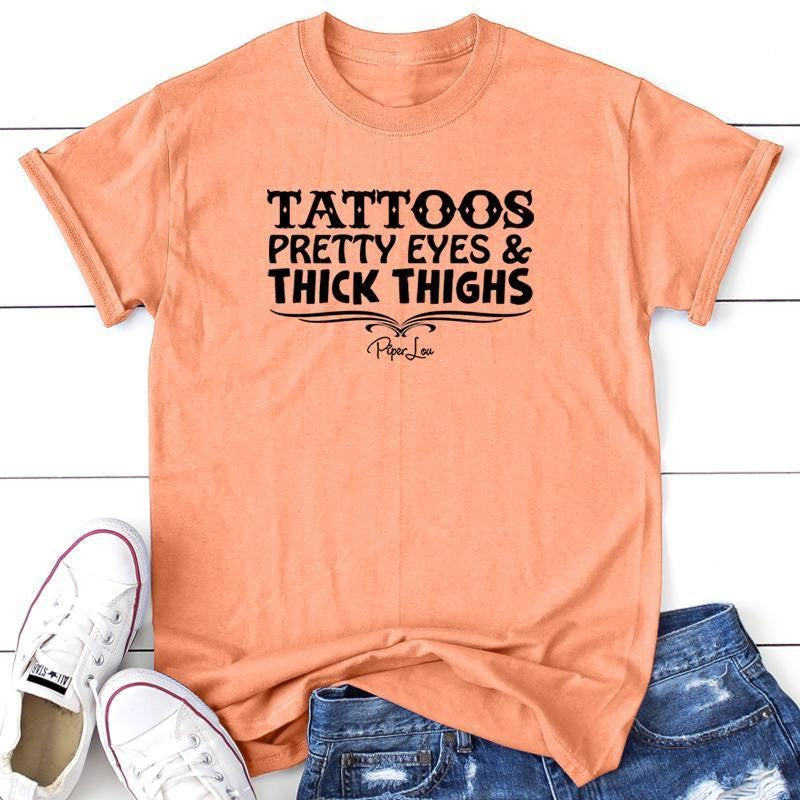 Tattoos Pretty Eyes And Thick Thighs Apparel, Proudly Printed In The USA, Tee / Tank / V Neck Gray / White / Blue / Hot Pink, #sassy #cute #blackprint